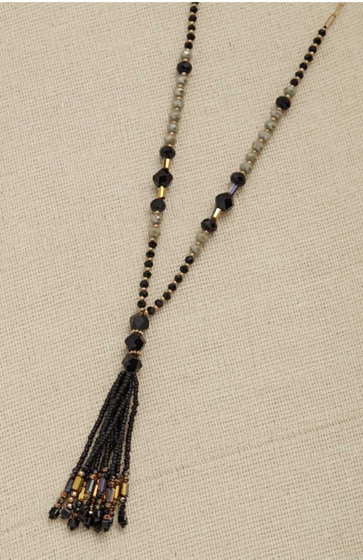 long beaded necklace with tassel